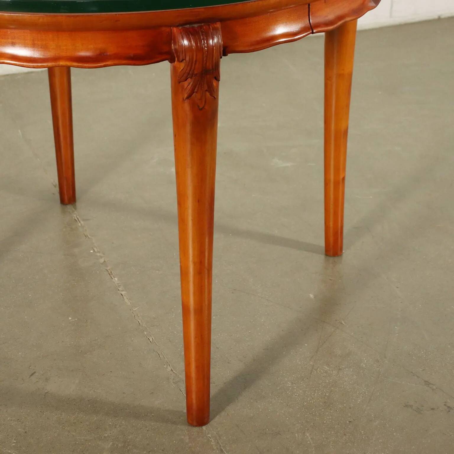 Table in solid beech, mahogany veneer and glass, Italy, 1950s.