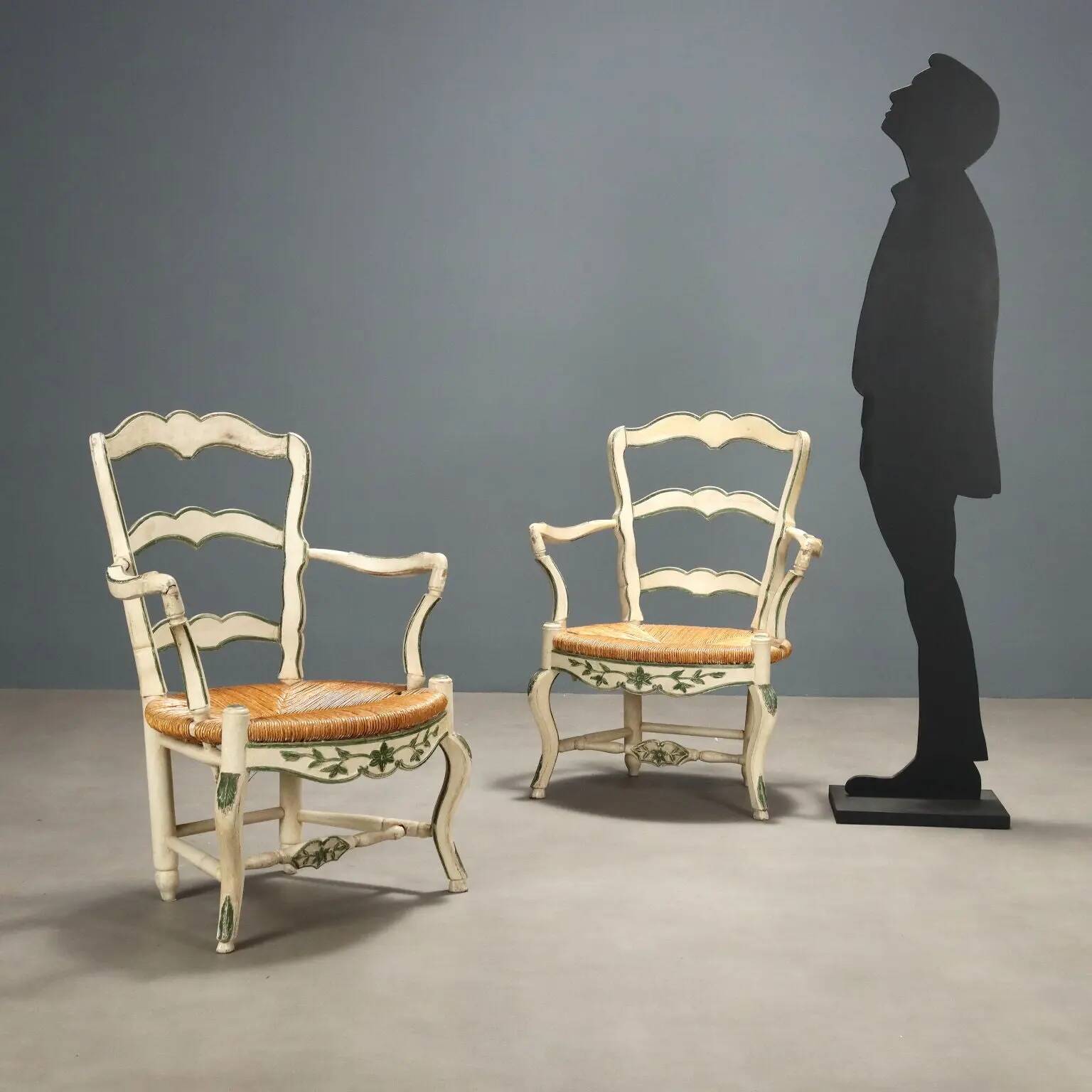 Antique baroque-style armchairs in lacquered wood from the 19th century.