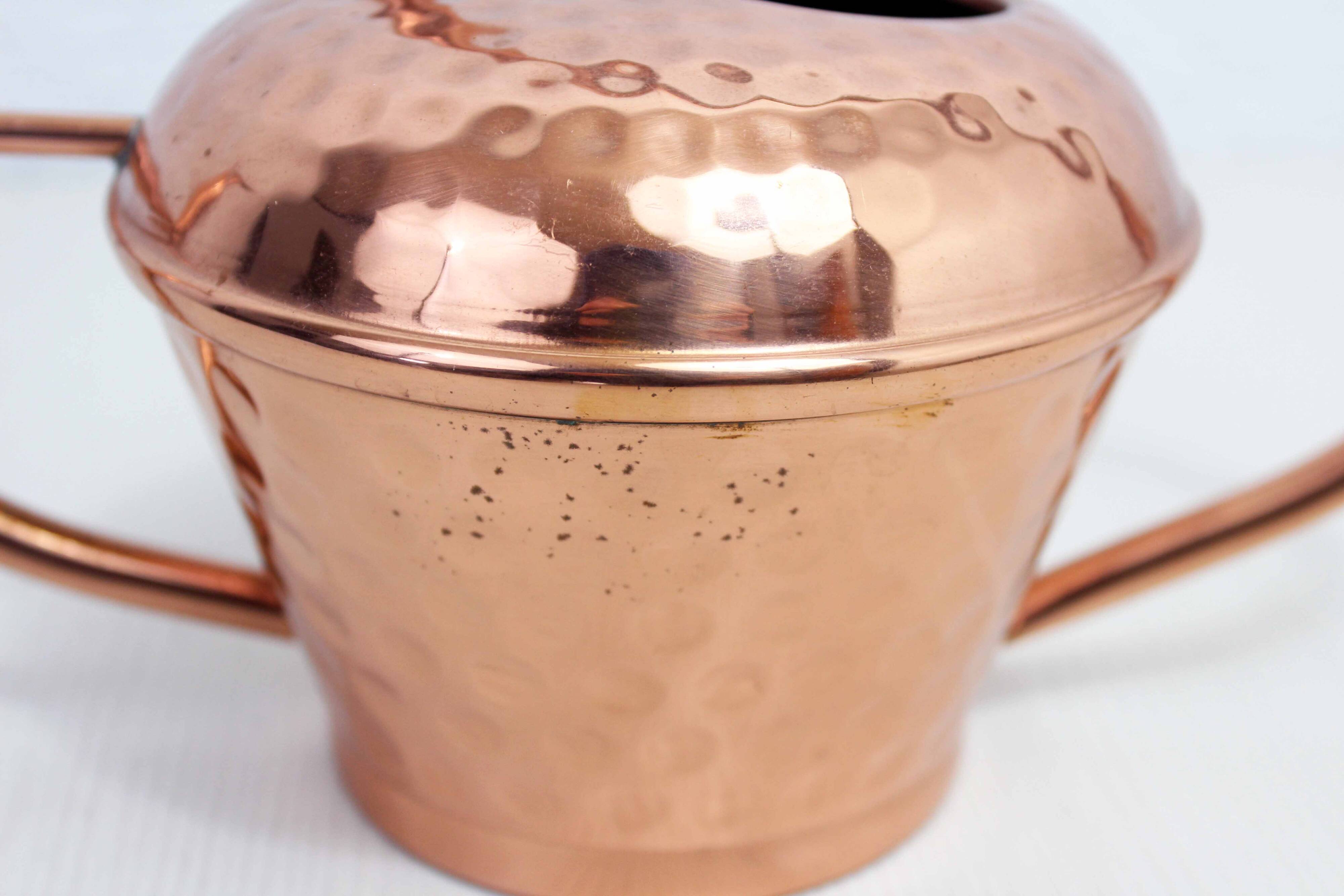 Vintage copper watering can