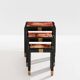 Set of three nesting tables with Asian decor, blackened wood, circa 1920.