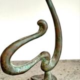 Set of four organically shaped bronze candlesticks in Art Nouveau style