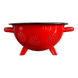 Red enameled sheet metal strainer