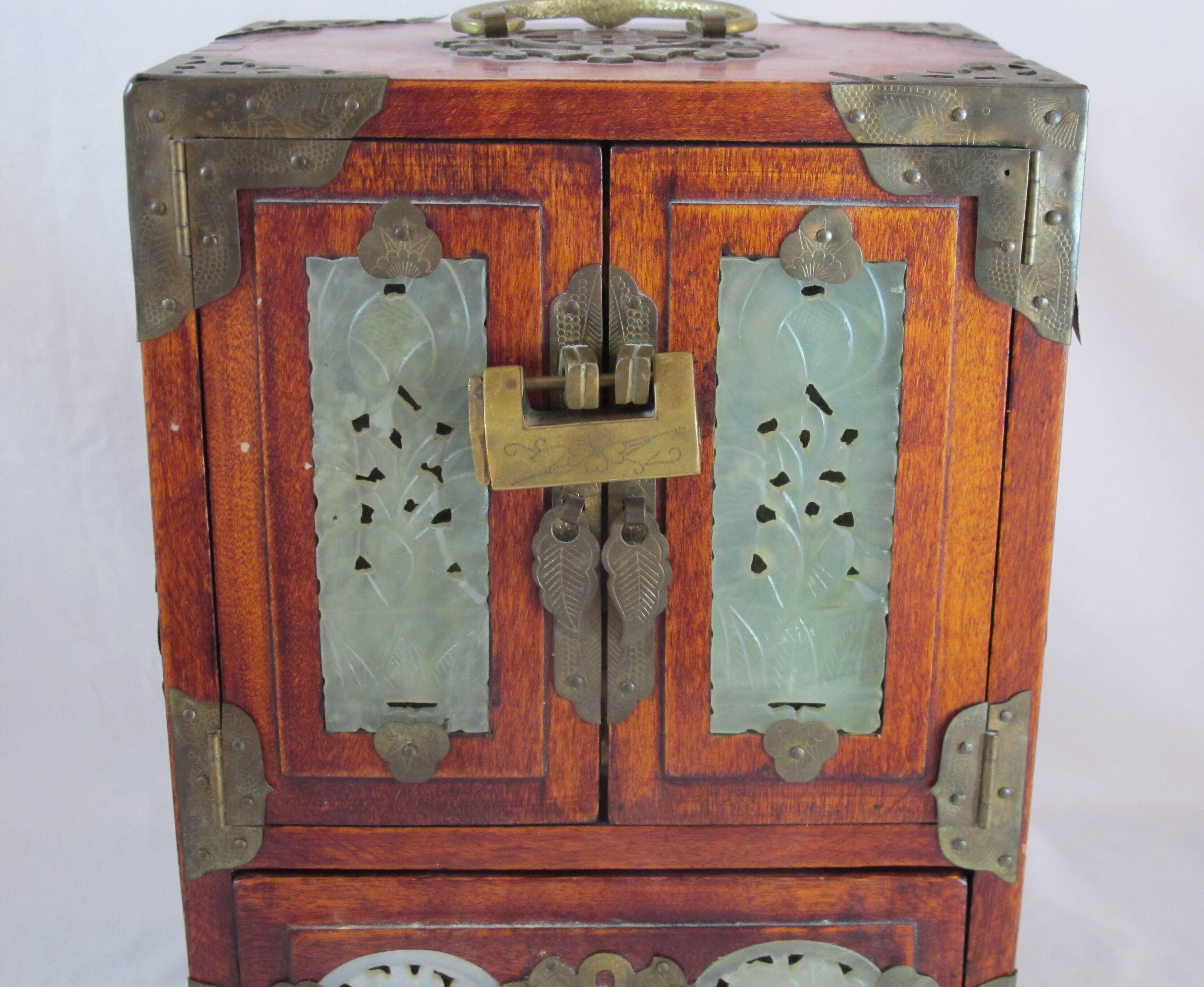 Chinese wooden jewelry box adorned with jade plates