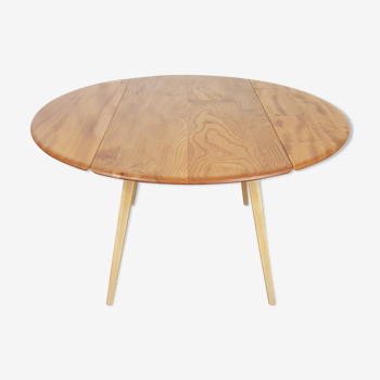 Ercol round drop leaf dining table, 1960s