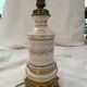 Lot including 2 oil lamps from the 19th century, equipped with their electric wire.