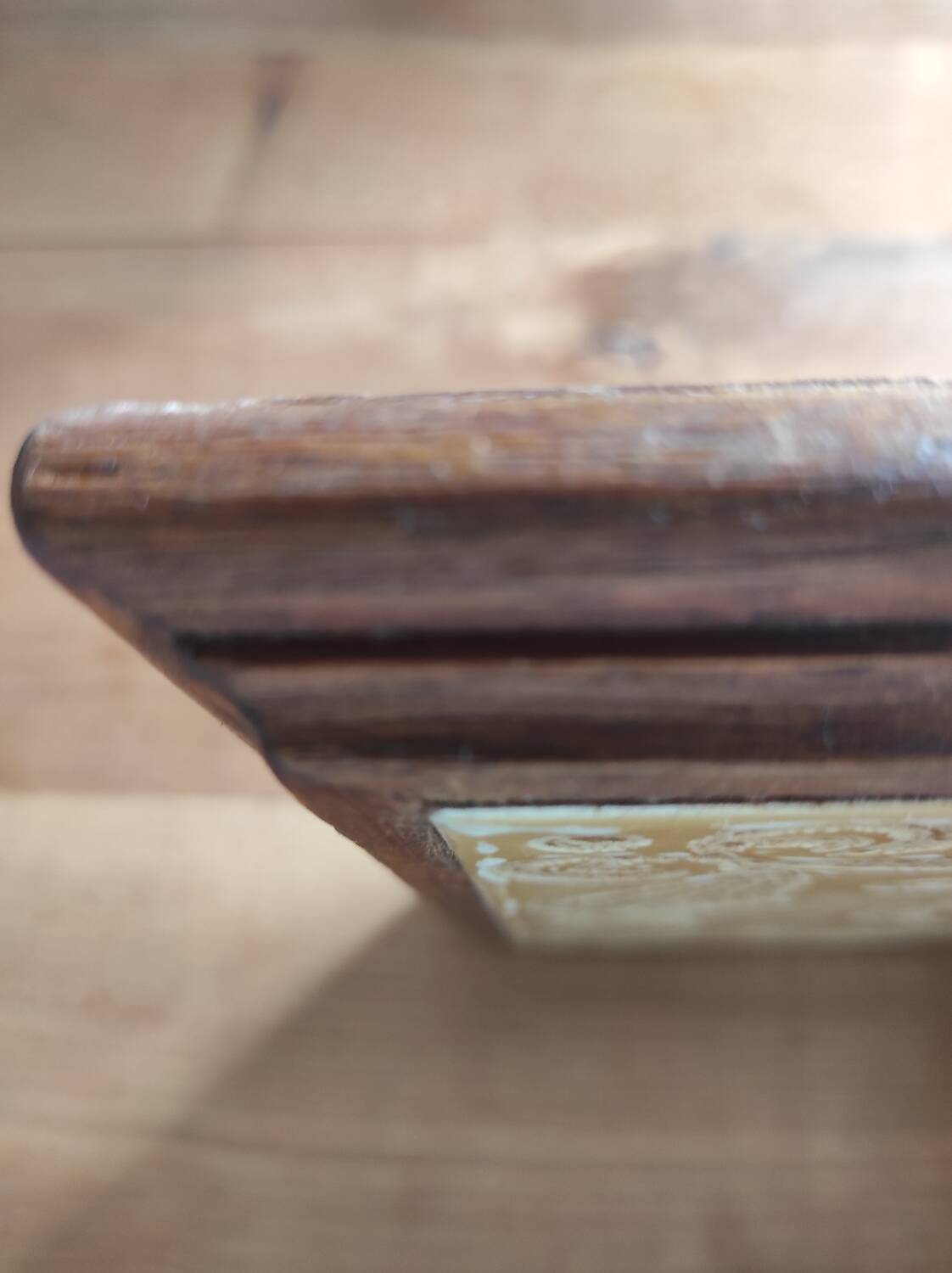 Wooden and ceramic trivet