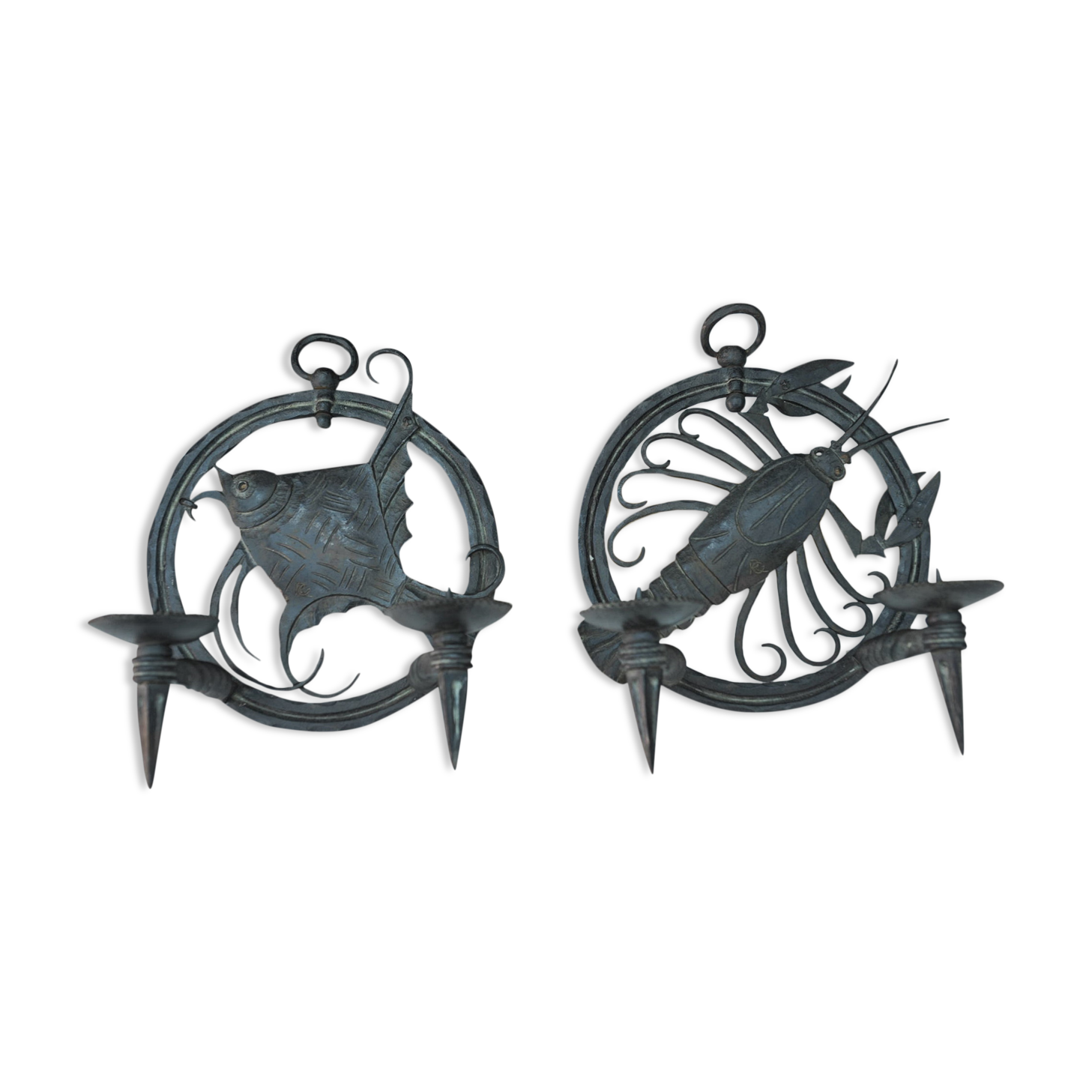 Pair of carved metal wall lamps signed RG