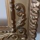 Miroir ancien en bois doré