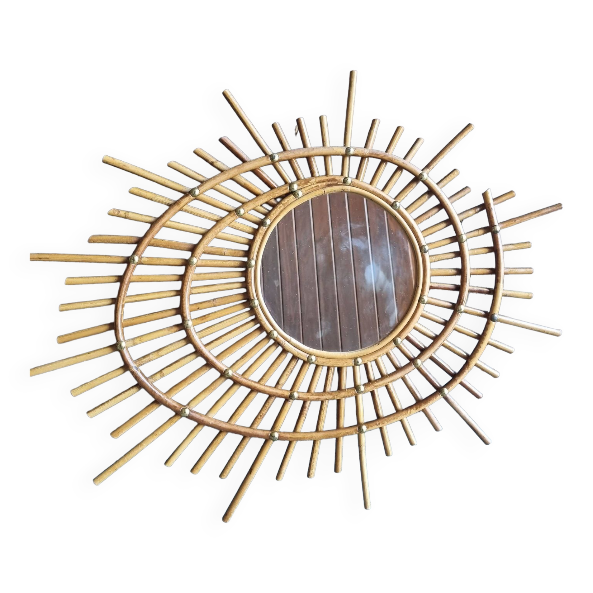 Asymmetrical rattan mirror