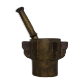 Old apothecary mortar with fins and its bronze pestle
