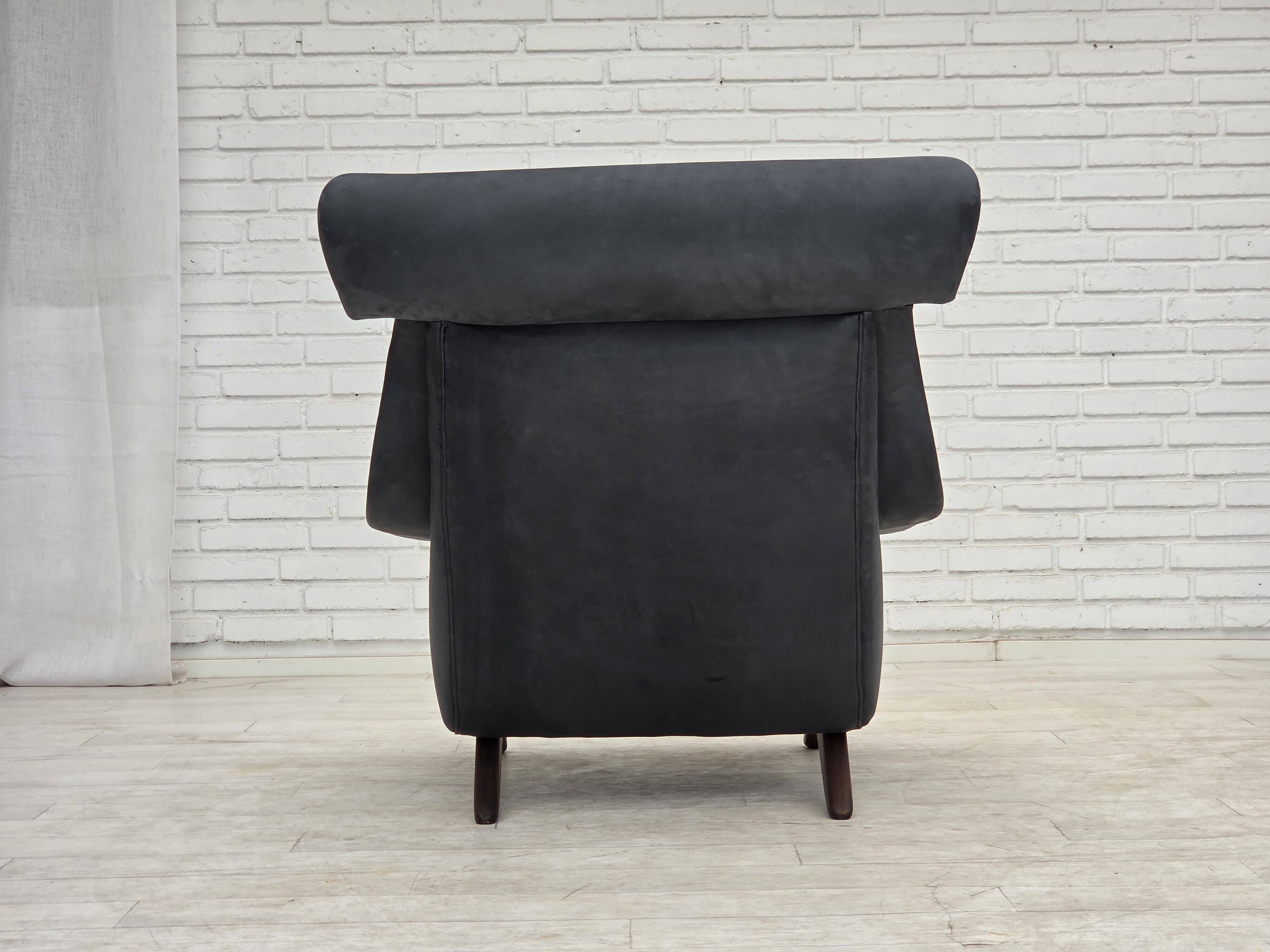 1970s, Danish design by Illum Wikkelsø, reupholstered armchair, leather.
