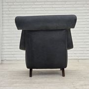 1970s, Danish design by Illum Wikkelsø, reupholstered armchair, leather.