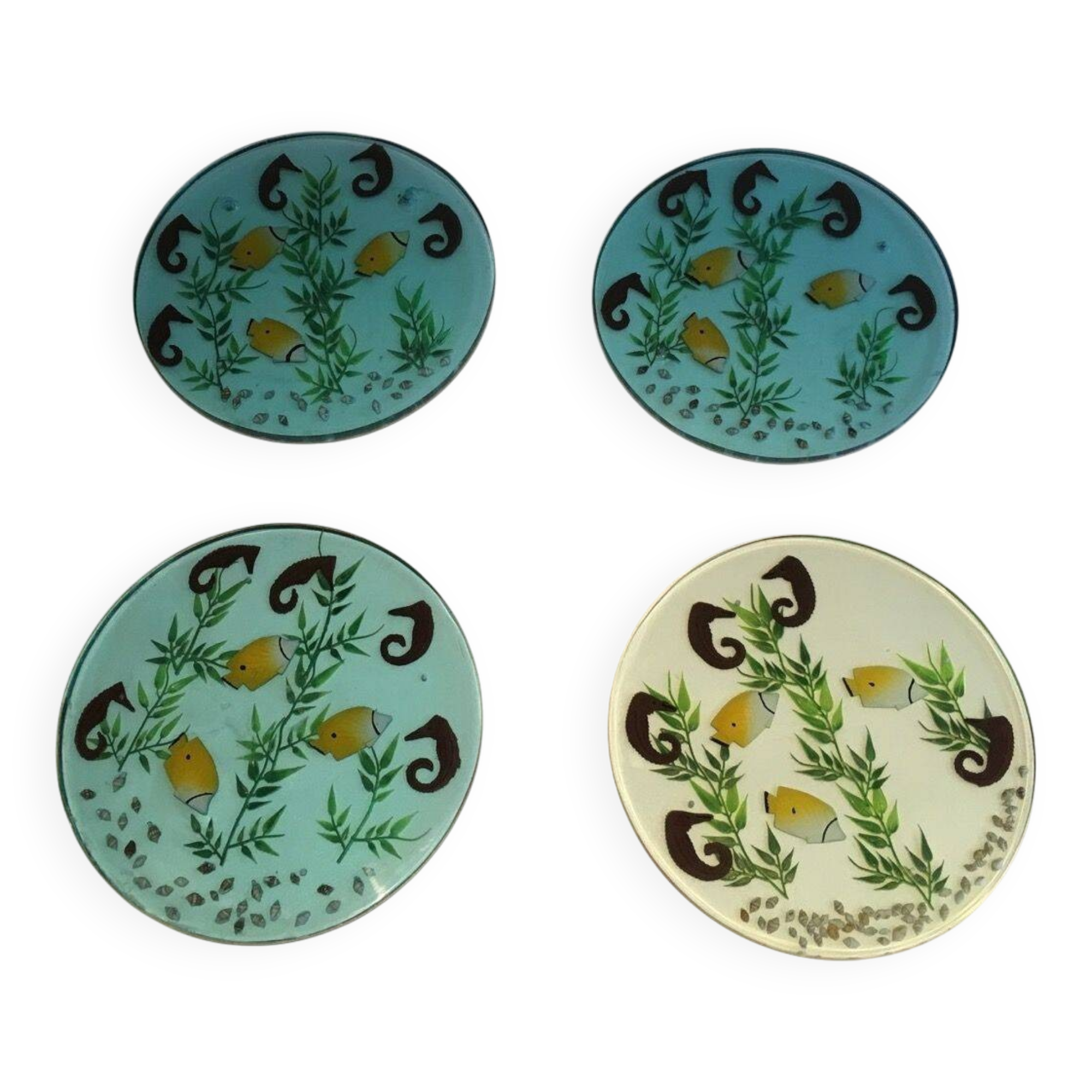 Set of 4 resin trays, inlaid with seahorses, fish, seaweed, and shells.
