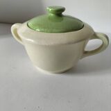 Two sugar bowls and a textured plate in turquoise and green Salins earthenware.