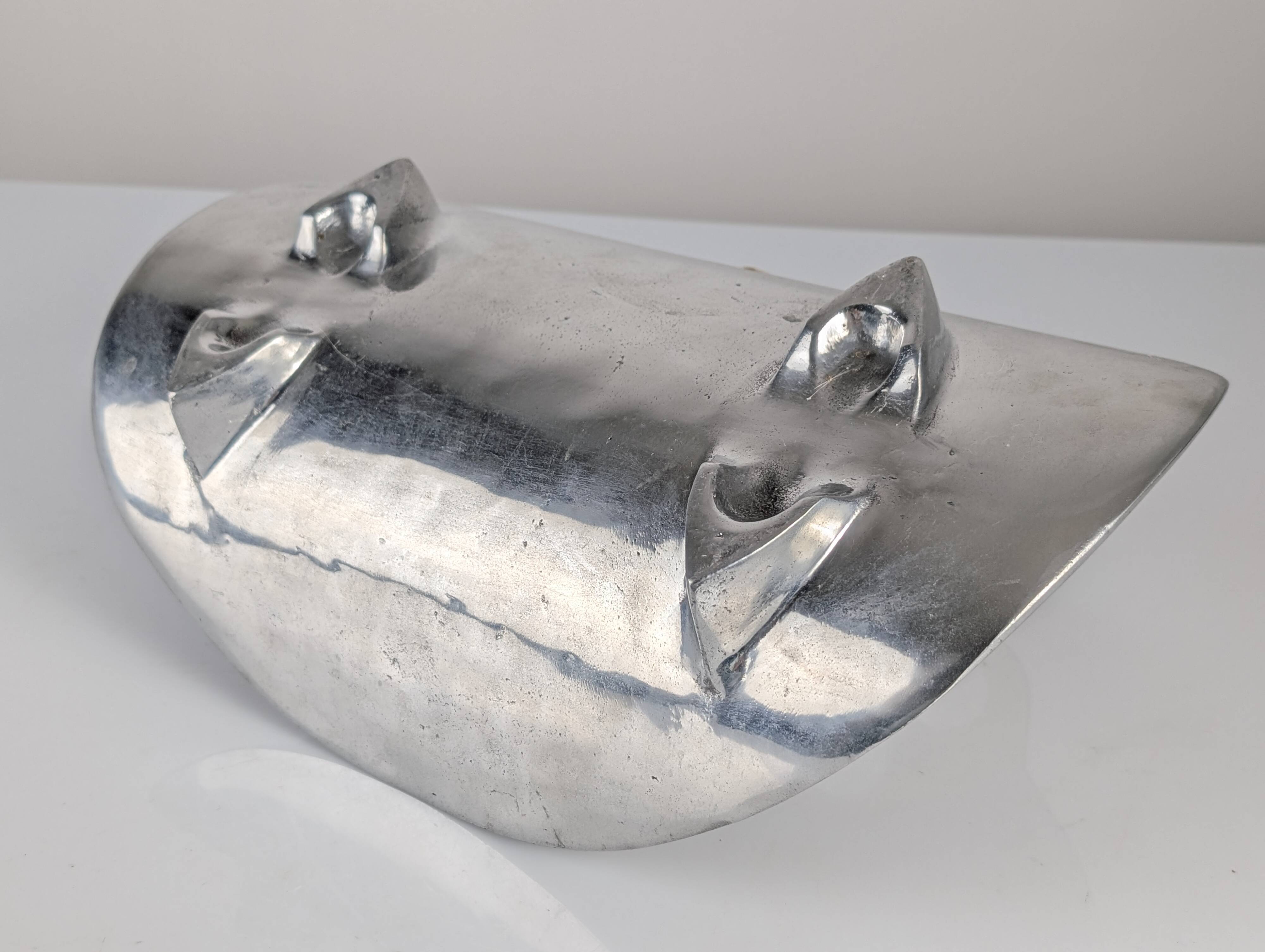 Aluminium and brass log holder by David Marshall, Spain, 1980s