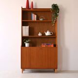 Vintage bookcase with storage compartment