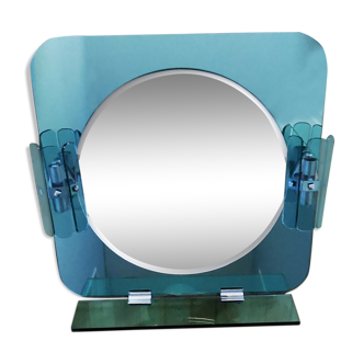 Blue glass mirror with two appliques and a tablet 1980