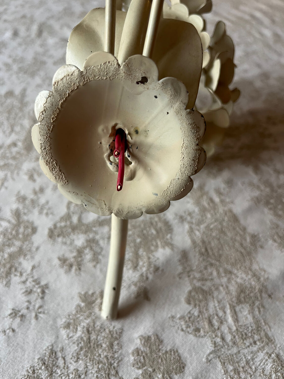 Ecru metal flower wall sconce