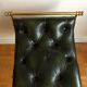 Pair of Chesterfield style brass and leather stools