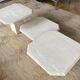 Set of three travertine coffee tables from the 70s