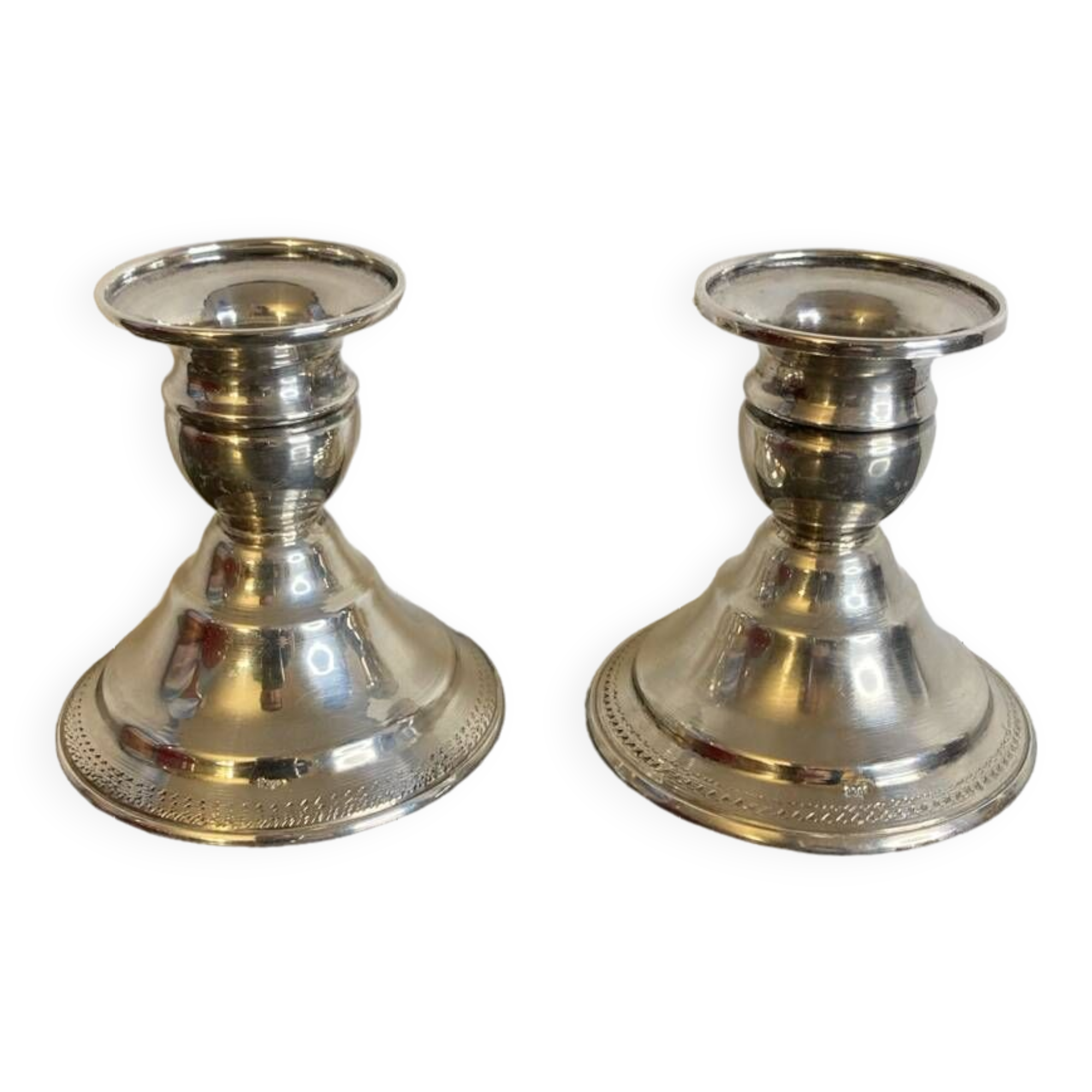 Pair of silver metal candlesticks