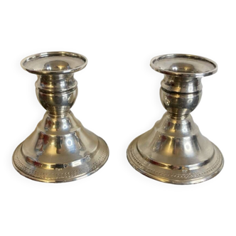 Pair of silver metal candlesticks
