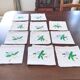 11 hand-embroidered antique table towels