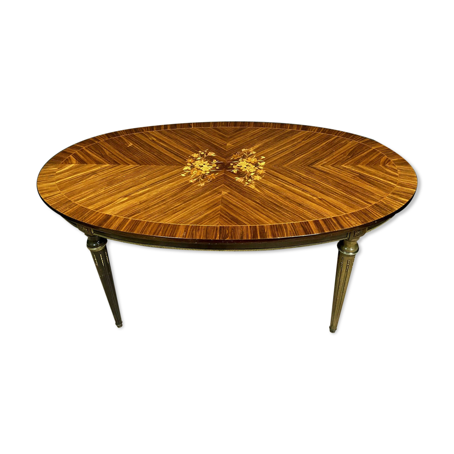 Louis XVI table has extensions in precious wood marquèterie