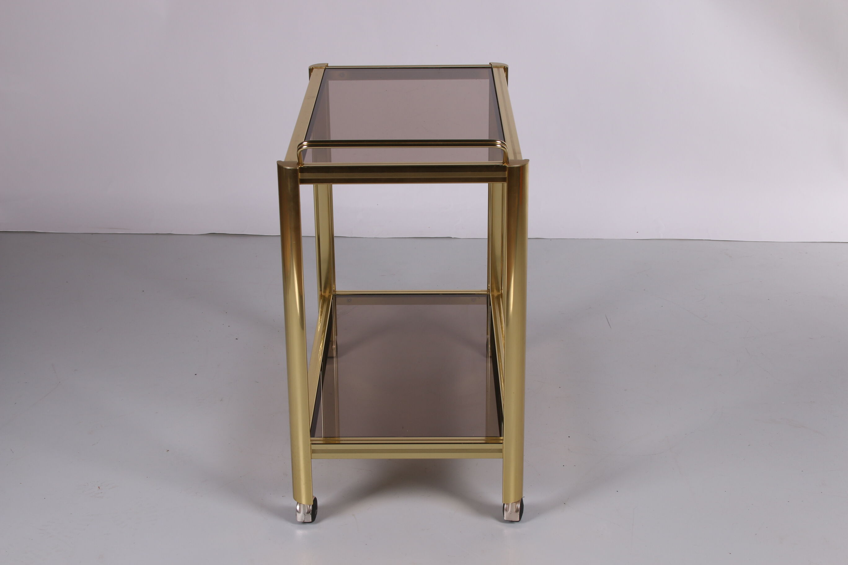 Hollywood Regency trolley with smoked glass