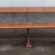 Old wooden bench with cast iron base