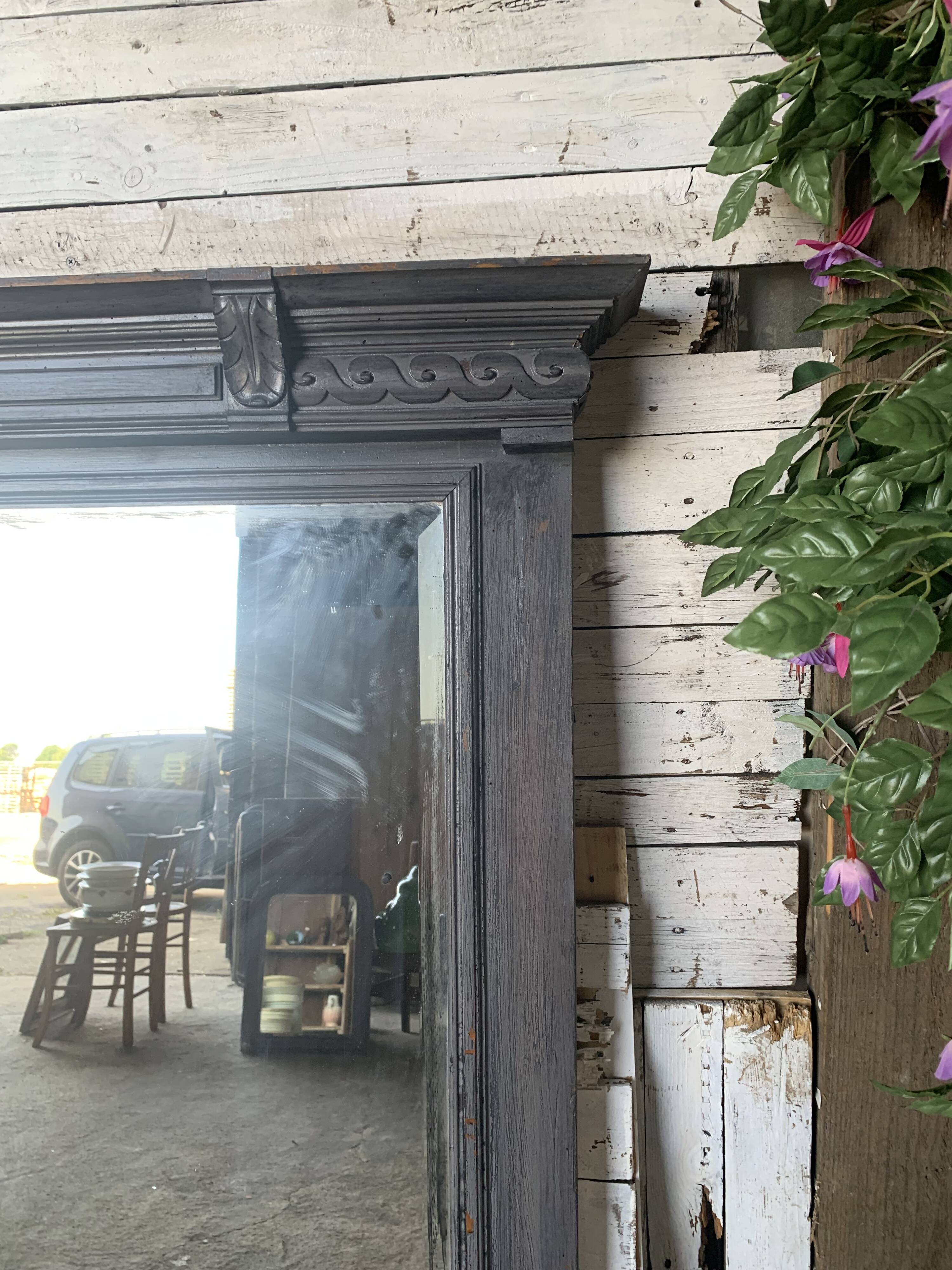 Wooden mirror with juice patina