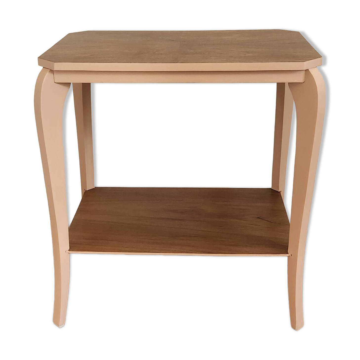 Side table with curved pink legs
