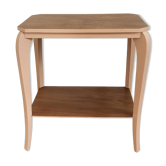 Side table with curved pink legs