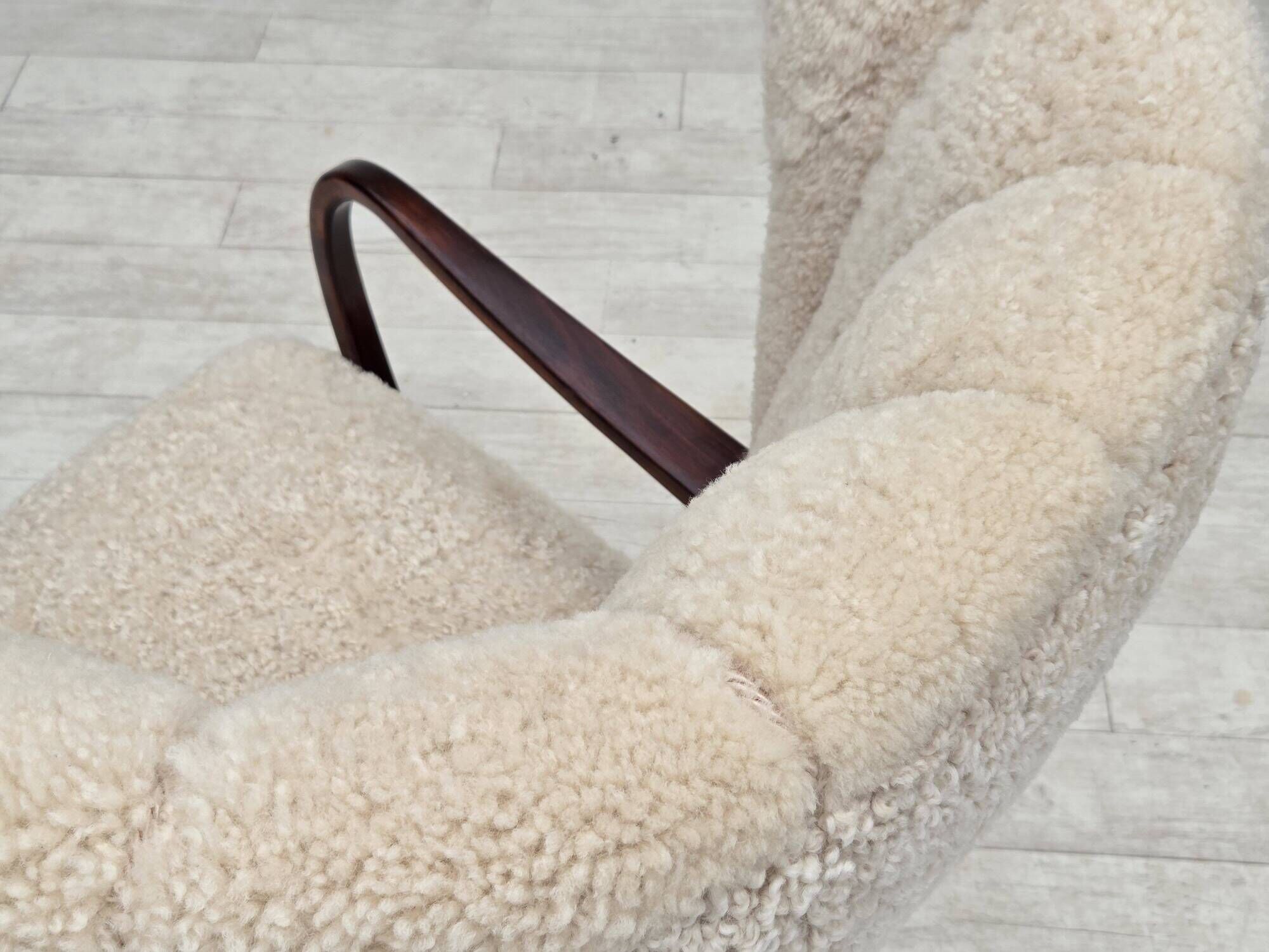 1960s, Danish high-back armchair, genuine sheepskin, reupholstered.