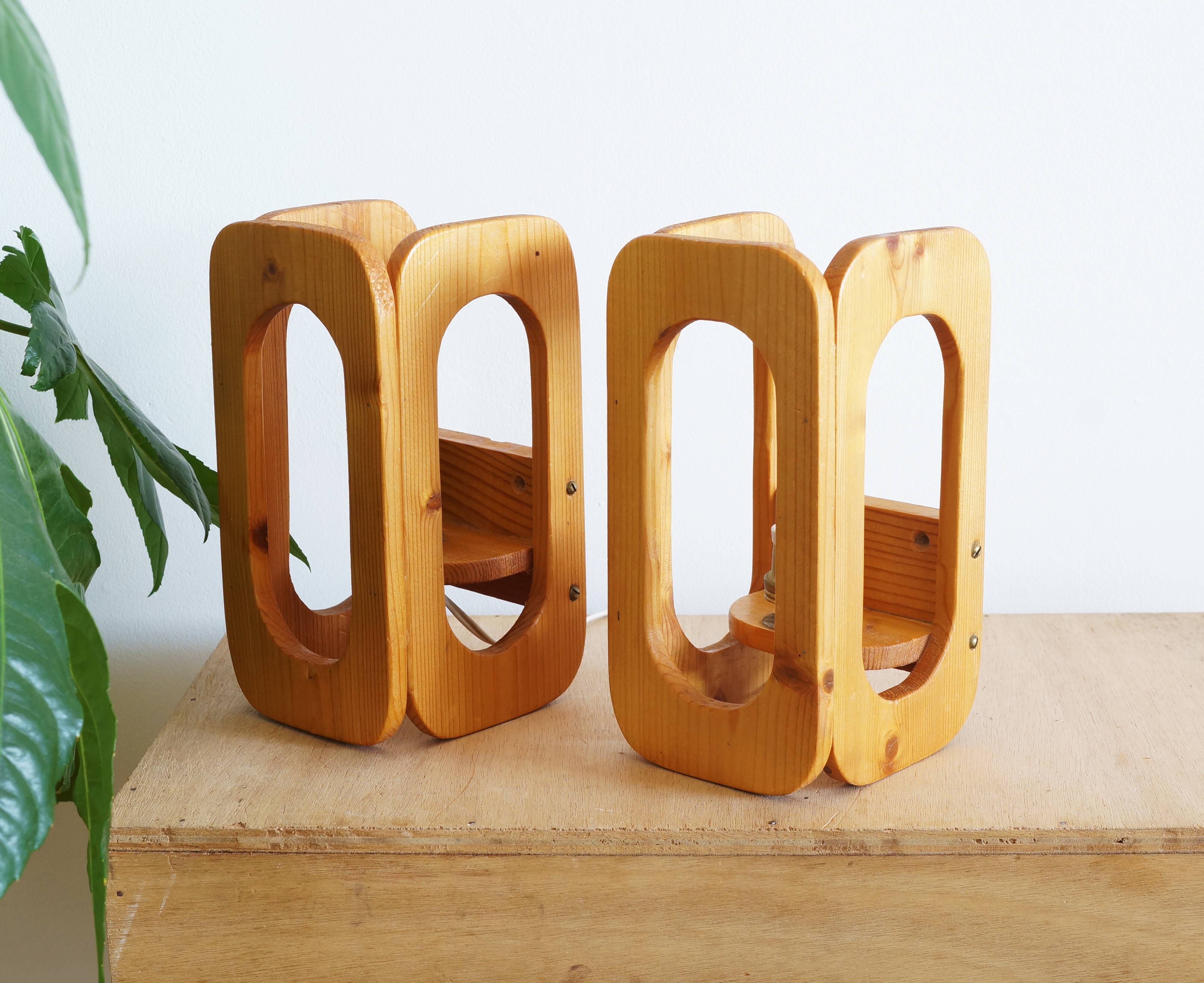 Two Scandinavian pine wall lamps in the 70s
