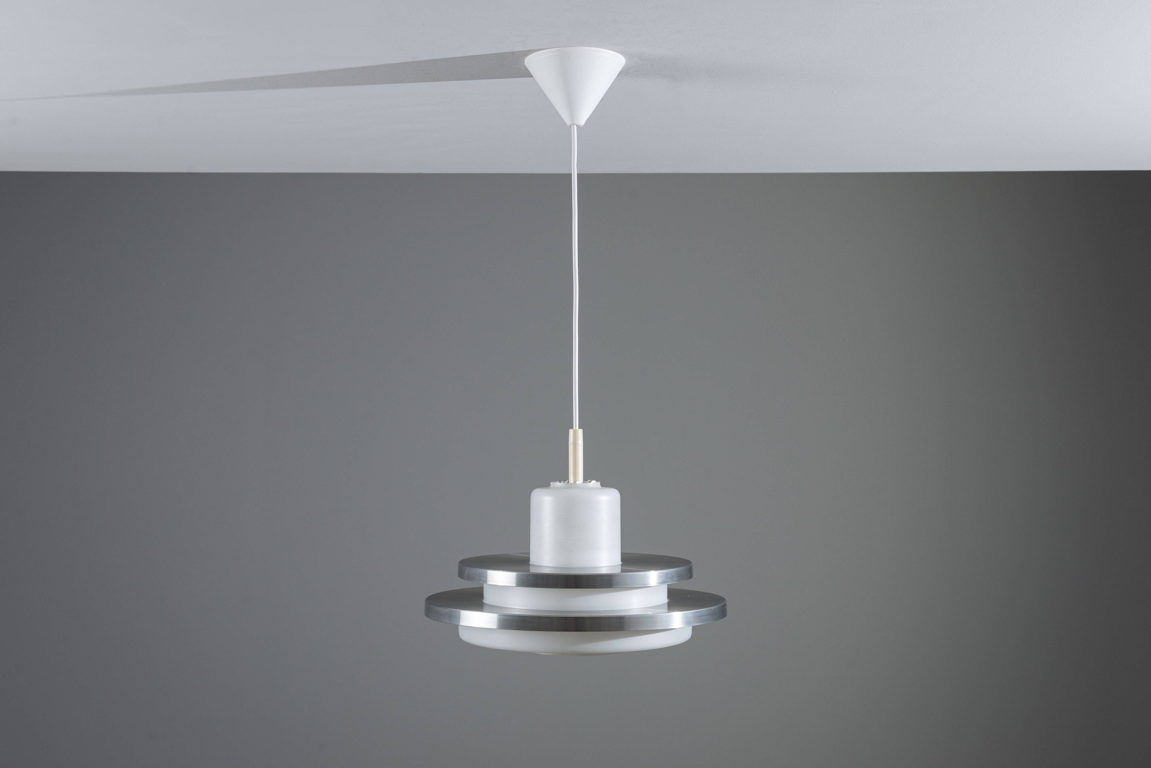 Doria pendant in opal glass with decorative aluminium discs
