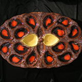 Service of 12 plates in oyster slip and its serving dish