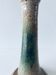 Enamelled terracotta candle holder