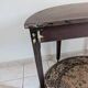 Old half-moon table or serving trolley on wheels