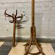 Baumann parrot coat rack