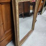19th century gilt mirror with flowers and foliage decor