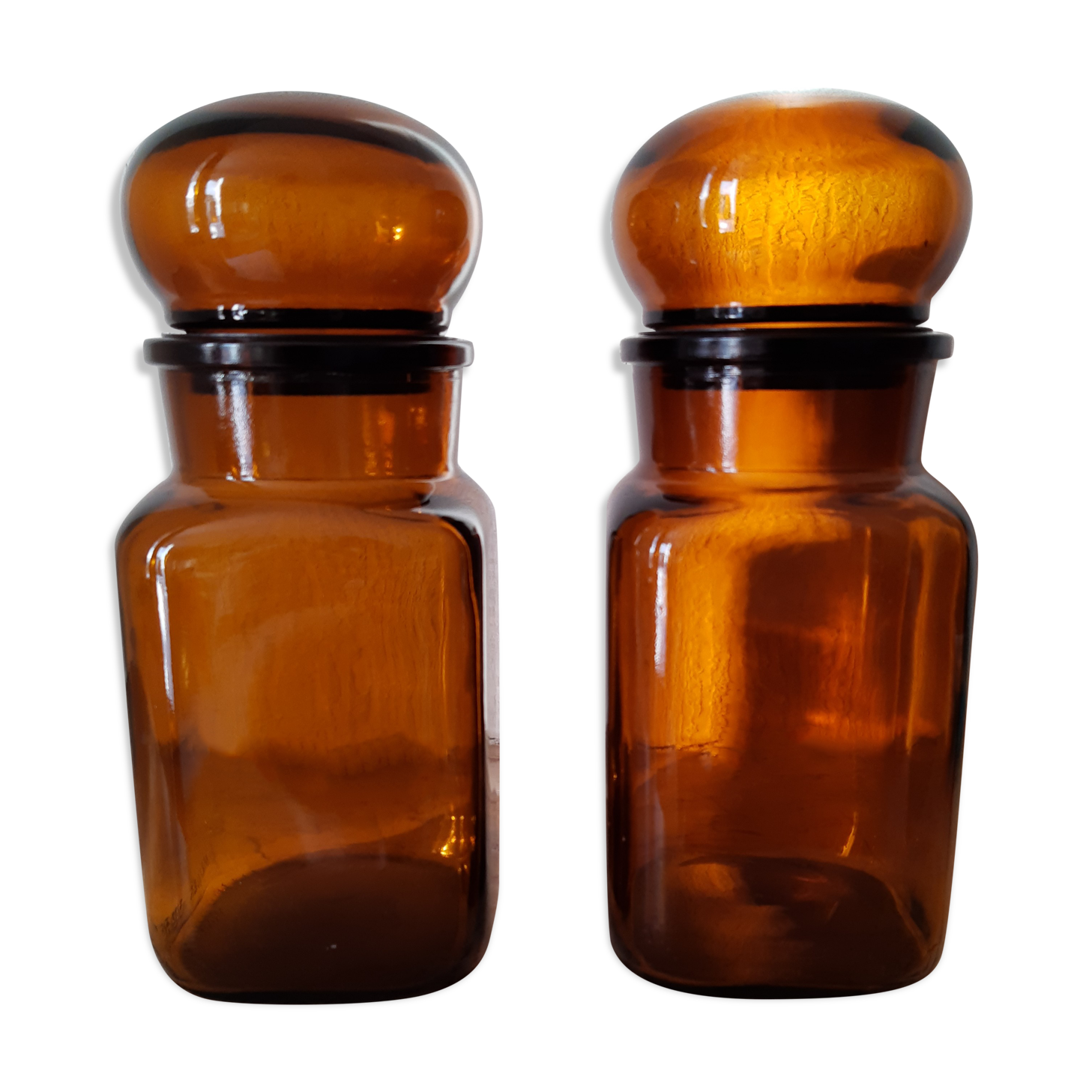 Pair of vintage amber glass jars