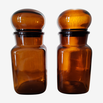 Pair of vintage amber glass jars