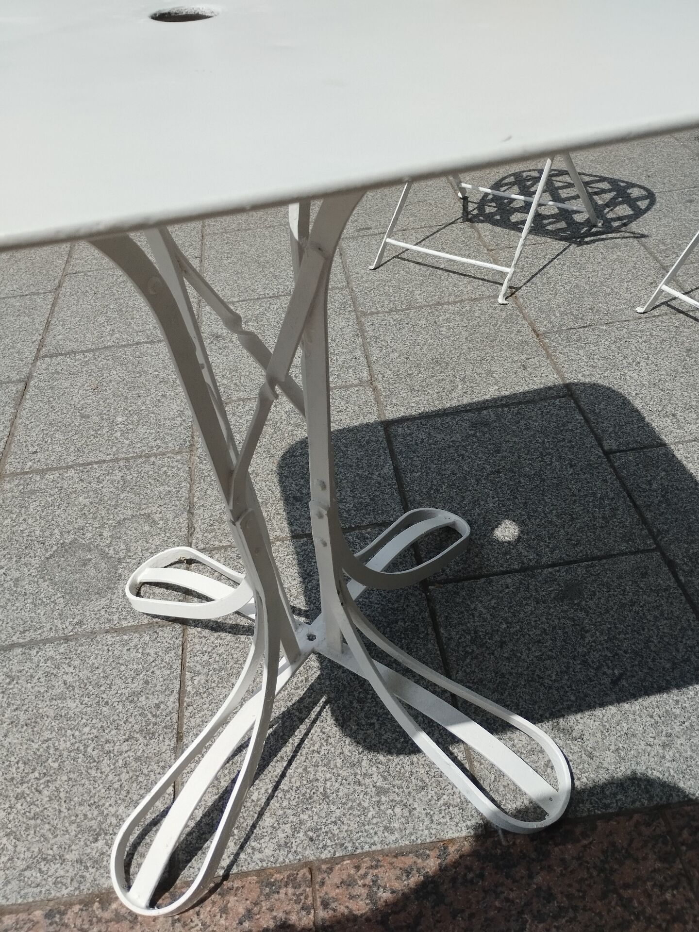 Antique garden furniture in solid wrought iron.