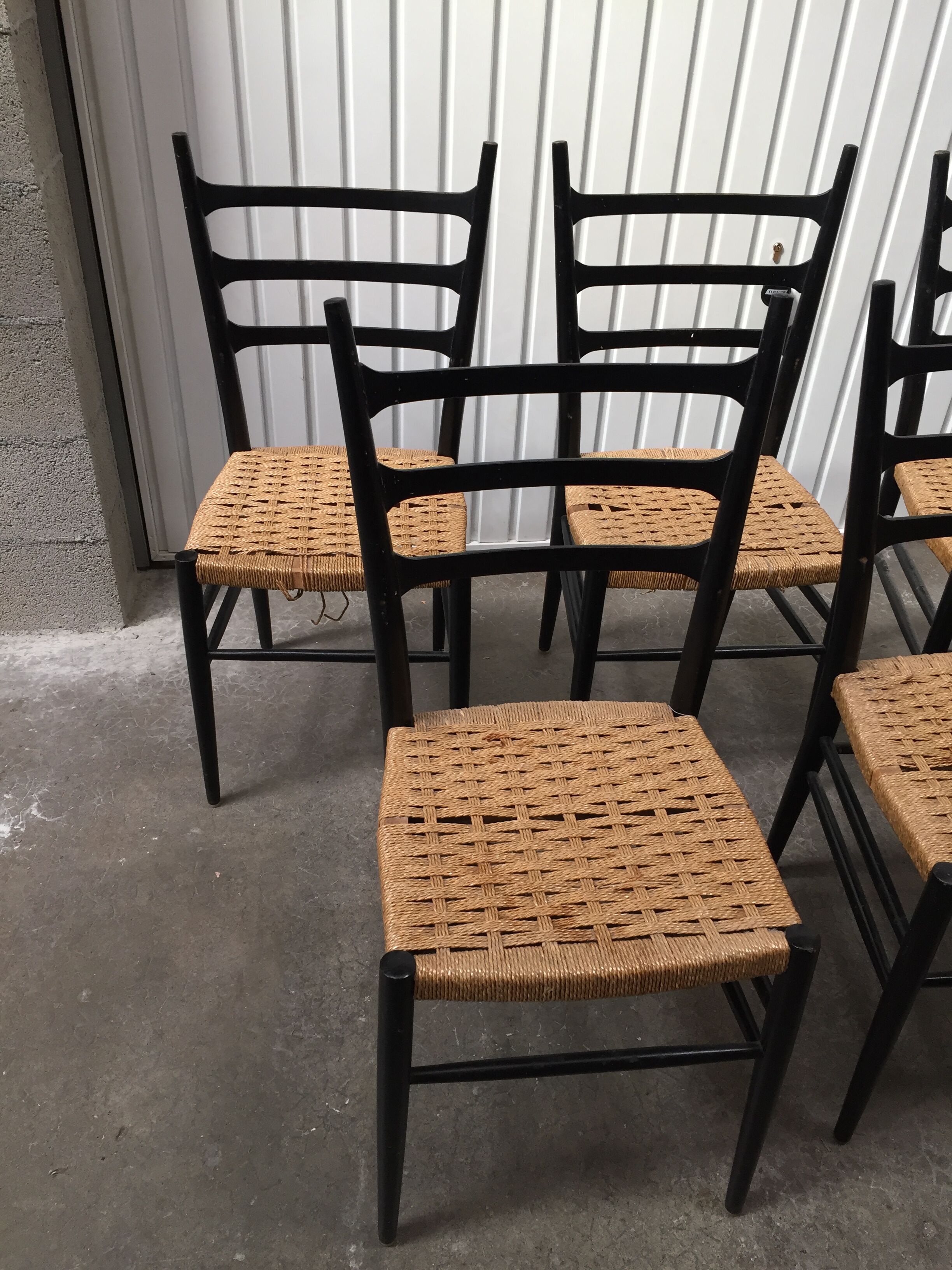 Set of 7 blackened wooden chairs, 1960s vintage