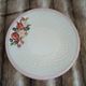 Assiette ancienne en barbotine