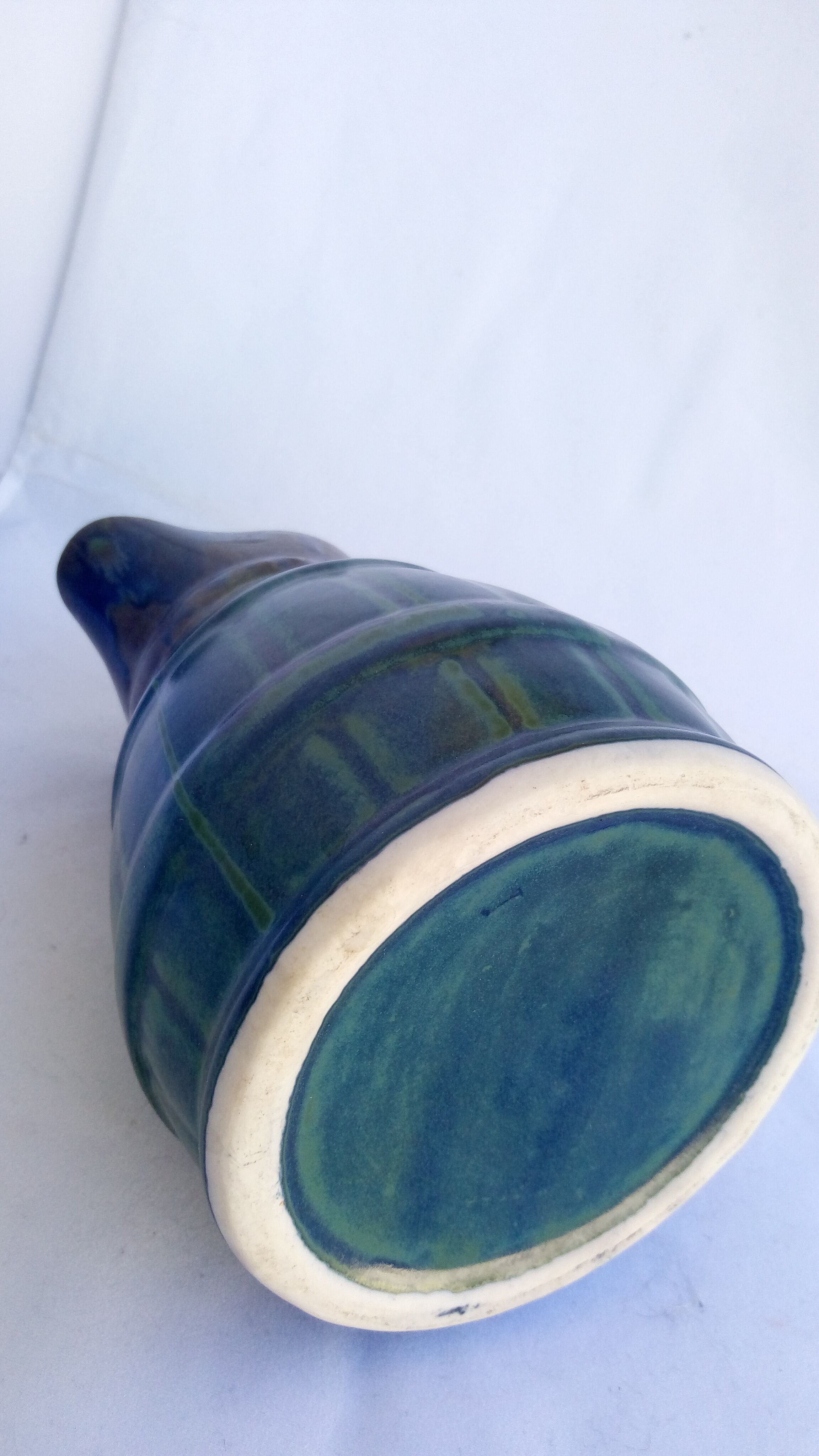 Black, blue, green pitcher