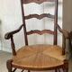 Antique ladderback chair, very high backrest, rush seat.