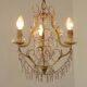 French gilt bronze three-light cage chandelier with pink and clear beaded swags.