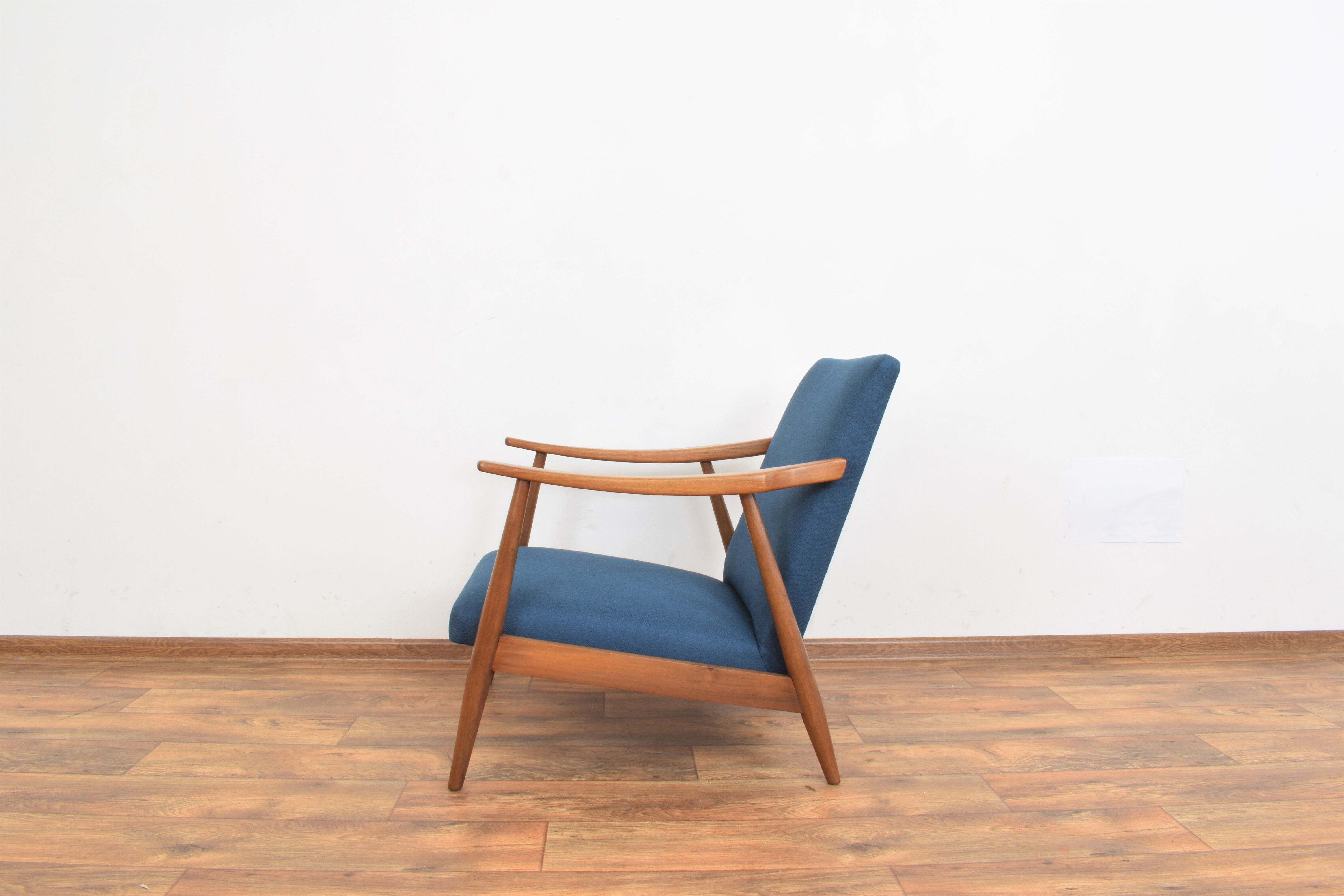 Teak desk and walnut armchair